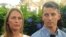 FILE - Denise Huskins and her boyfriend, Aaron Quinn, listen as their attorneys speak at a news conference on July 13, 2015, in Vallejo, Calif. 