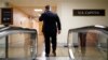 FILE - A man speaks on his phone at the Capitol in Washington, June 22, 2022. Lobbying firms in Washington reportedly are dropping clients from China amid growing concerns about Beijing’s influence on Capitol Hill.