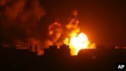 Fire and smoke rises from buildings following Israeli airstrikes on Gaza City, Nov. 5, 2023. 