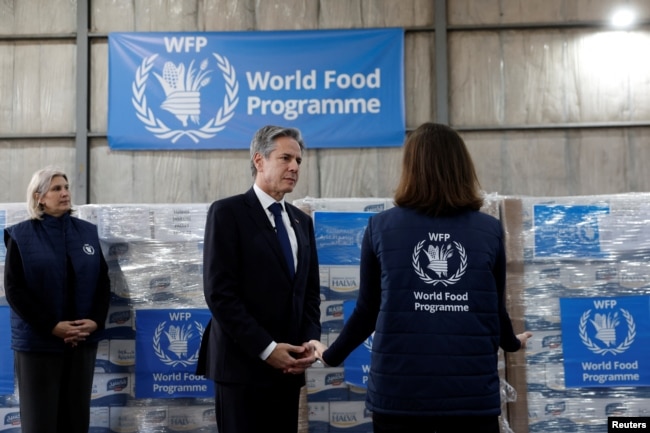 U.S. Secretary of State Antony Blinken visits a World Food Program (WFP) regional warehouse, during Blinken's week-long trip aimed at calming tensions across the Middle East, in Amman, Jordan, Jan. 7, 2024.