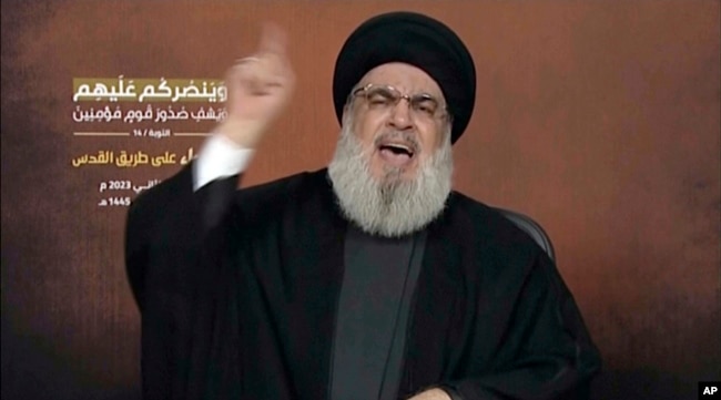 This video grab shows Hezbollah leader Sayyed Hassan Nasrallah speaking via a video link, during a rally in Beirut, Nov. 3, 2023.