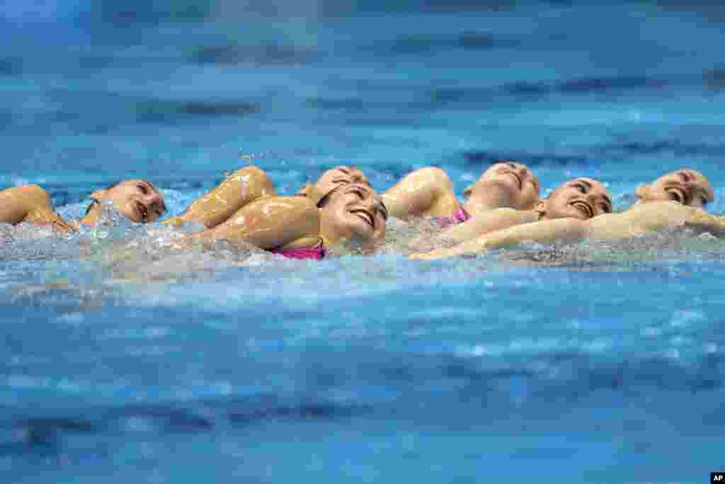 Germany team competes in the team acrobatic final of artistic swimming at the World Swimming Championships in Fukuoka, Japan.