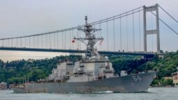FILE - The U.S. Navy destroyer USS Carney sets sail in the Bosphorus in Istanbul, Turkey, July 14, 2019. The destroyer shot down Houthi drones in the Red Sea on Dec. 3, 2023. 