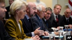 European Council President Charles Michel, second from left, speaks as European Commission President Ursula von der Leyen, left, listens during a meeting with U.S. President Joe Biden and other officials at the White House in Washington, Oct. 20, 2023.