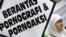 Sejumlah umat muslim mendukung RUU anti-pornografi yang kontroversial di Jakarta, 21 Mei 2006 sebagai ilustrasi. Jumlah perempuan di Indonesia yang menjadi korban dari aksi penyebaran konten intim non-konsensual semakin bertambah. (Foto: AFP/Bay Ismoyo)