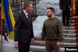 Ukraine's President Volodymyr Zelenskyy meets with Latvian President Edgars Rinkevics, amid Russia's attack on Ukraine, in Kyiv, Nov. 24, 2023. (Ukrainian Presidential Press Service via Reuters)