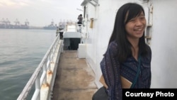 Alicia Chen is pictured in December 2020 on a fishing vessel docked in Donggang, southern Taiwan, where she was working on an investigative piece on fishing crimes. (Haohsiang Ko)