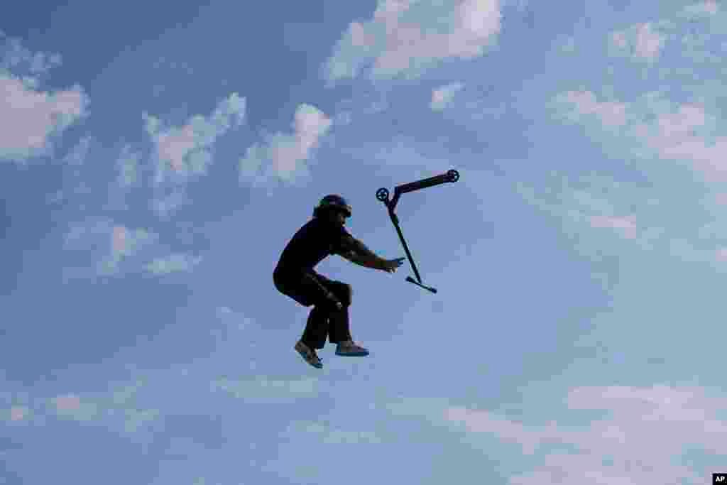 A participant performs acrobatics during an international Urban Sports event in Madrid, Spain.