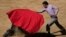 Mexican bullfighter Sergio Flores demonstrates his capework during a bullfighting workshop, in Aculco, Mexico, Jan. 25, 2024.