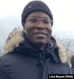 Youssouf Doucoure from Mali works in France borrowing legal papers belonging to family members.