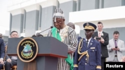 Liberia's president-elect Joseph Boakai, who defeated President George Weah in a runoff election, gives a speech after he was sworn in as president during the inauguration ceremony in Monrovia, Jan. 22, 2024. 