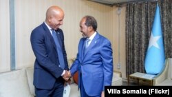 Xasan Sheekh iyo Brian Nelson