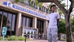 Flerentin “Flex” Jean-Baptiste, 16, of Medford, Mass., poses for a photo at Medford High School, Friday, Aug. 2, 2024, in Medford. (AP Photo/Josh Reynolds)