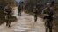 British troops, part of NATO's reinforcements, patrol the Kosovo-Serbia border in Jarinje, Kosovo, Nov. 24, 2023. 