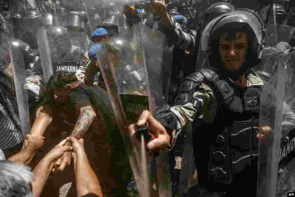 Turkish soldiers of the Gendarmerie General Command use pepper spray against demonstrators during clashes in Ikizkoy, in the Milas district of the Province of Mugla.&nbsp;Locals and environmental activists engaged in their fifth day of demonstrating against the deforestation project of the century-old pine forest, intended to expand a lignite field in the forests of Akbelen in Ikizkoy.