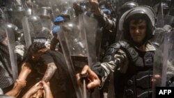 Turkish soldiers of the Gendarmerie General Command use pepper spray against demonstrators during clashes in Ikizkoy, in the Milas district of the Province of Mugla. Local residents and environmental activists engaged in their fifth day of demonstrating against the deforestation project of the century-old pine forest, intended to expand a lignite field in the forests of Akbelen in Ikizkoy.