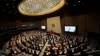 South Korean lawmakers salute their national flag during the opening session of the 22nd National Assembly in Seoul, South Korea, Sept. 2, 2024.