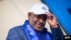 FILE - Incumbent Comoros President and presidential candidate for the Convention for the Renewal of the Comoros (CRC) party, Azali Assoumani, gestures during his last rally ahead of the presidential elections in Moroni, on January 12, 2024.