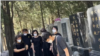 2023年6月4日，天安门母亲群体部分成员在北京万安公墓集体向六四死难者致祭。不远处疑似有便衣人员监视。（天安门母亲提供视频截图）