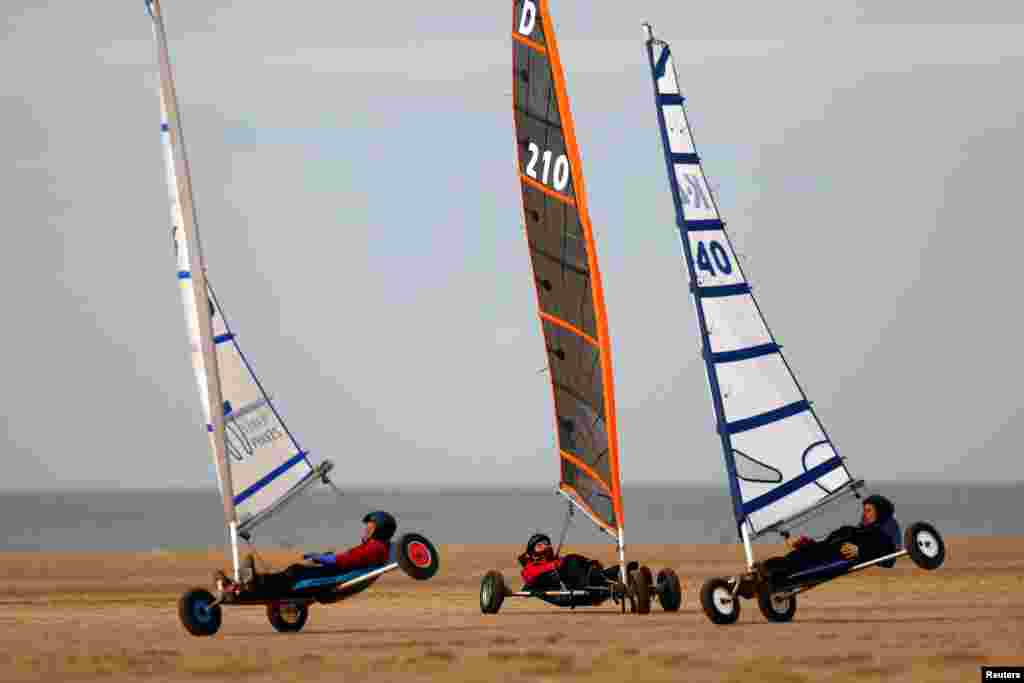 Pilots race on the beach during the miniyacht European Championships in Lytham St Annes, Lancashire, Britain.