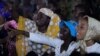 Des chrétiens nigérians manifestent pour la paix après les attaques de Noël