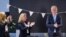 Far-right Party for Freedom leader Geert Wilders, right, celebrates with Fleur Agema, section left, and other party members after winning the most votes in a general election, in The Hague, Netherlands, Nov. 23, 2023. 