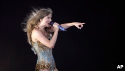 FILE - Taylor Swift performs at SoFi Stadium in Los Angeles, California, Aug. 7, 2023. Thousands of fans who missed seeing Swift perform in the U.S. last year are flying to Europe to see her perform there this year.