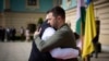 In this photo provided by the Ukrainian Presidential Press Office, Indian Prime Minister Narendra Modi, left, hugs Ukrainian President Volodymyr Zelenskyy in Kyiv, Ukraine, Aug. 23, 2024.