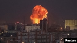 An explosion after a Russian missile strike is seen in the sky over the city of Kyiv, Ukraine, Sept. 2, 2024. 