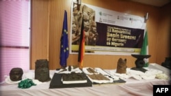 This Dec. 20, 2022, image taken at the Nigerian Ministry of Foreign Affairs in Abuja, Nigeria, shows Benin bronze artifacts, some of the thousands of 16th- to 18th-century metal plaques, sculptures and objects looted from the ancient Kingdom of Benin. In December, Germany handed back some looted artifacts to Nigeria more than 100 years after the pieces were stolen during a ransacking of an ancient kingdom by British colonial forces.