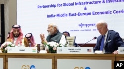 
Saudi Arabian Crown Prince Mohammed bin Salman Al Saud, left, Indian Prime Minister Narendra Modi, center, and U.S. President Joe Biden attend Partnership for Global Infrastructure and Investment event at G20 summit in New Delhi, India, Sept. 9, 2023. 
