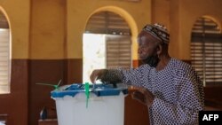 A voter casts his ballot in a referendum in Bamako, Mali, June 18, 2023. 