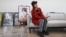 Tanaka, whose real name is Kim Kyung-wook, sings a song during an interview with Reuters in Seoul, South Korea, May 16, 2023. The comedian's Japanese-inspired character has made him one of South Korea's hottest YouTube stars. 