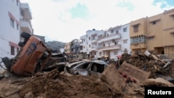A view shows cars and other property damaged by fierce floods in Derna, Libya, Sept. 28, 2023.