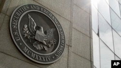 FILE - The seal of the U.S. Securities and Exchange Commission at SEC headquarters in Washington, June 19, 2015. On Jan. 9, 2024, the SEC said its X social media account had been hacked and the announcement of the approval of a bitcoin exchange-traded fund was "unauthorized."