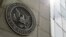 FILE - The seal of the U.S. Securities and Exchange Commission at SEC headquarters in Washington, June 19, 2015. On Jan. 9, 2024, the SEC said its X social media account had been hacked and the announcement of the approval of a bitcoin exchange-traded fund was "unauthorized."