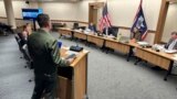 Grand Teton National Park Superintendent Palmer "Chip" Jenkins Jr. addresses Wyoming's Board of Land Commissioners after its 5-0 vote not to auction off for now a large piece of state land within the park, Dec. 7, 2023, in Cheyenne.