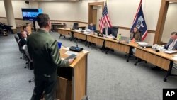 Grand Teton National Park Superintendent Palmer "Chip" Jenkins Jr. addresses Wyoming's Board of Land Commissioners after its 5-0 vote not to auction off for now a large piece of state land within the park, Dec. 7, 2023, in Cheyenne.