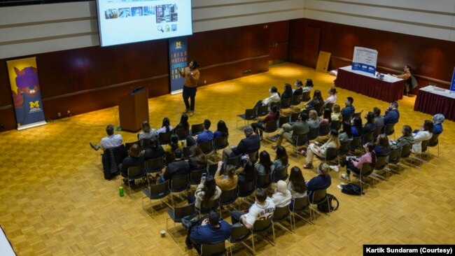 Kartik Sundaram giving a lecture on UX at the University of Michigan.