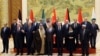 中国外长王毅在北京钓鱼台国宾馆会见一个由阿拉伯国家与伊斯兰国家外长组成的代表团。（2023年11月20日）