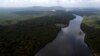 FILE - The Essequibo River flows through the Kurupukari crossing in Guyana, Nov. 19, 2023. Venezuela has long claimed Guyana's Essequibo territory, a region larger than Greece.
