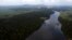 FILE - The Essequibo River flows through the Kurupukari crossing in Guyana, Nov. 19, 2023. Venezuela has long claimed Guyana's Essequibo territory, a region larger than Greece.