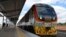 FILE - One of Kenya's newly acquired standard gauge rail locomotive rolls into Voi railway station on May 31, 2017, in Voi, Kenya, on the inaugural ride of Kenya's new China-financed standard gauge railway from the city of Mombasa to the capital, Nairobi.