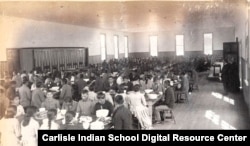 Students dining at the Carlisle Indian Boarding School, Carlisle, Pa., ca. 1880-1889.