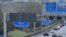 Warnings for strong winds are displayed to traffic using the M25 motorway, near Swanley, south of London, Jan. 21, 2024. Amber warnings for wind were in place in the UK on Sunday, as Storm Isha approached the country. 