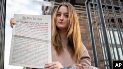 Emmy Martin, editor in chief of The Daily Tar Heel, the student newspaper of the University of North Carolina at Chapel Hill, poses with a copy of the Aug. 30 paper outside of the newsroom on Oct. 9, 2023, in Chapel Hill, NC. 