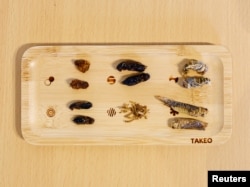 Various insects on a plate are pictured at Take-Noko cafe in Tokyo, Japan, July 21, 2023. (REUTERS/Kim Kyung-Hoon)