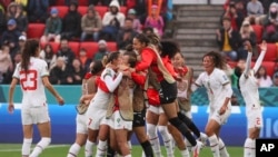 Morocco players celebrate following the Women's World Cup Group H soccer match between South Korea and Morocco in Adelaide, Australia, July 30, 2023. 