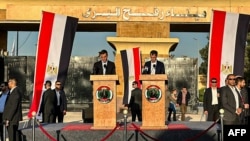 Spanish Prime Minister Pedro Sanchez, left, and Belgian Prime Minister Alexander De Croo hold a joint press conference on the Egyptian side of the Rafah border crossing with the Gaza Strip, in the northeastern Sinai province, Nov. 24, 2023.