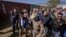U.S. House Speaker Mike Johnson, center left, and Texas Department of Public Safety Chief Steve McCraw, center right, lead a group of Republican members of U.S. Congress during a tour of the Texas-Mexico border, in Eagle Pass, Texas, Jan. 3, 2024.